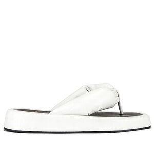 White elevated flip flops